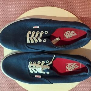 VANS  navy blue low sporty sneakers.  Size 12 women. 10.5 men